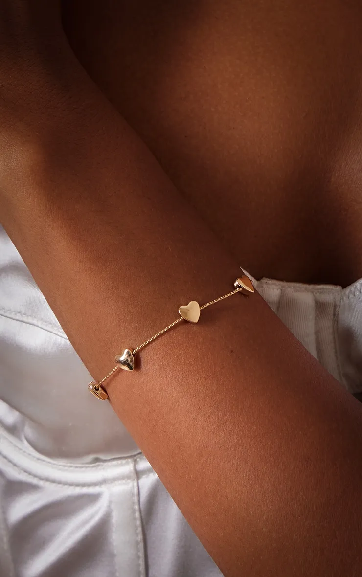 Bracelet doré à détail coeur
