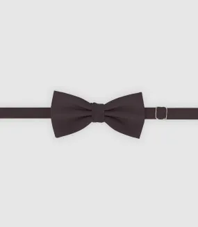 Nud papillon en tissu prune